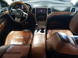 2013 Jeep Grand Cherokee Overland with VIN 1C4RJFCG7DC646348, listed as a Copart auction lot 49526415 with 137,889 mi miles and Clean Title. Bid and sale history available at carsss.com. Image 8.