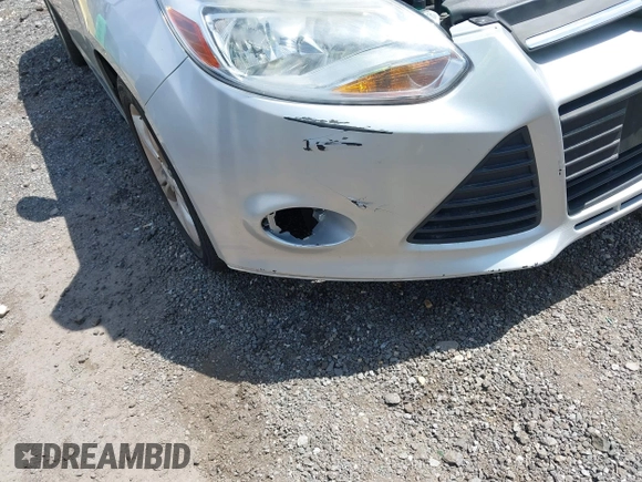 2013 Ford Focus SE with VIN 1FADP3F28DL307076, listed as a IAAI auction lot 42098620 with 182,555 mi miles. Bid and sale history available at carsss.com. Image 6.
