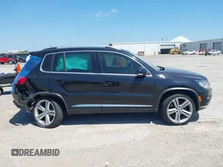 2014 Volkswagen Tiguan SEL with VIN WVGAV3AX4EW025339, listed as a IAAI auction lot 42313665 with 96,756 mi miles and . Bid and sale history available at DreamBid. Image 13.