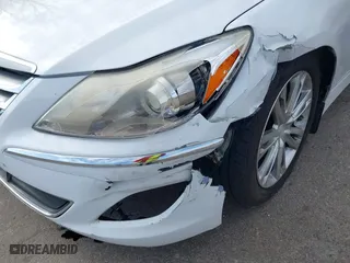 2013 Hyundai Genesis 3.8L with VIN KMHGC4DD1DU237732, listed as a IAAI auction lot 41911514 with 121,266 mi miles. Bid and sale history available at carsss.com. Image 6.