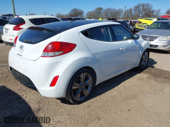 2016 Hyundai Veloster z VIN KMHTC6AD3GU267365, wystawiony jako IAAI lot #41469796 z przebiegiem 111 791 mil mil oraz . Historia ofert i sprzedaży dostępna na DreamBid. Obrazek 4.