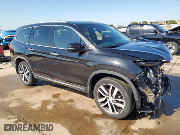 2017 Honda Pilot Elite with VIN 5FNYF6H04HB023609, listed as a Copart auction lot 52235425 with 107,997 mi miles and Salvage Title. Bid and sale history available at DreamBid. Image 4.