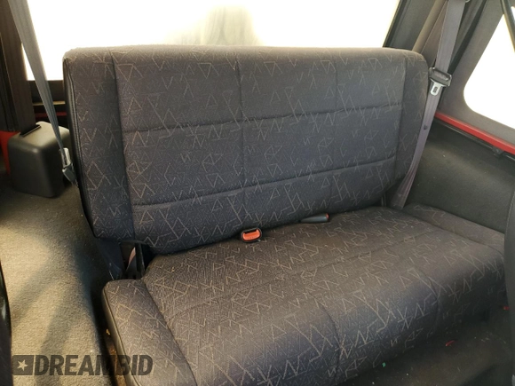 2001 Jeep Wrangler Sport with VIN 1J4FA49S51P365327, listed as a Copart auction lot 61720115 with 194,086 mi miles and Salvage title. Bid and sale history available at DreamBid. Image 11.