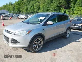 2016 Ford Escape Titanium with VIN 1FMCU9J97GUB91966, listed as a IAAI auction lot 42378829 with 121,218 mi miles and . Bid and sale history available at DreamBid. Image 17.