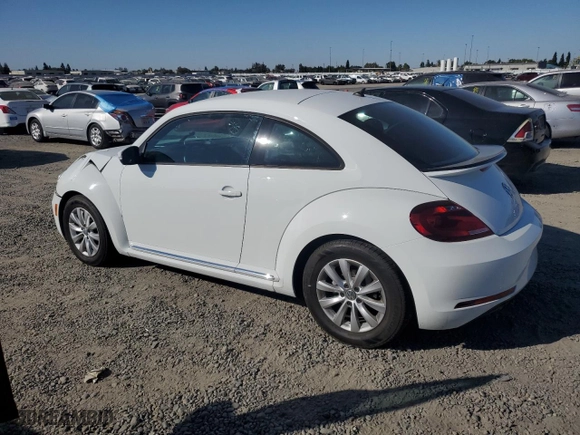 2019 Volkswagen Beetle S with VIN 3VWFD7AT3KM710393, listed as a Copart auction lot 72270664 with 63,627 mi miles and Salvage Title. Bid and sale history available at carsss.com. Image 2.