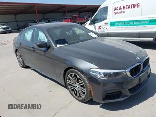 2019 BMW 5 Series 530i xDrive with VIN WBAJA7C50KG910479, listed as a IAAI auction lot 41802413 with 84,932 mi miles. Bid and sale history available at carsss.com. Image 1.