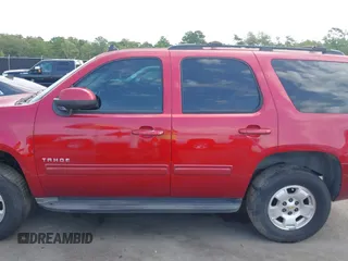 2013 Chevrolet Tahoe LS with VIN 1GNSCAE00DR359498, listed as a IAAI auction lot 40125477 with 156,100 mi miles and . Bid and sale history available at DreamBid. Image 13.