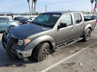 2005 Nissan Frontier LE with VIN 1N6AD07U15C401058, listed as a Copart auction lot 45760095 with 153,232 mi miles and Salvage title. Bid and sale history available at DreamBid. Image 1.