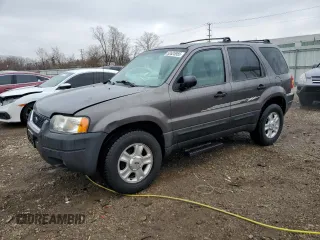 2003 Ford Escape XLT Popular with VIN 1FMYU031X3KA80715, listed as a Copart auction lot 52625955 with 89,877 mi miles and Salvage title. Bid and sale history available at DreamBid. Image 1.