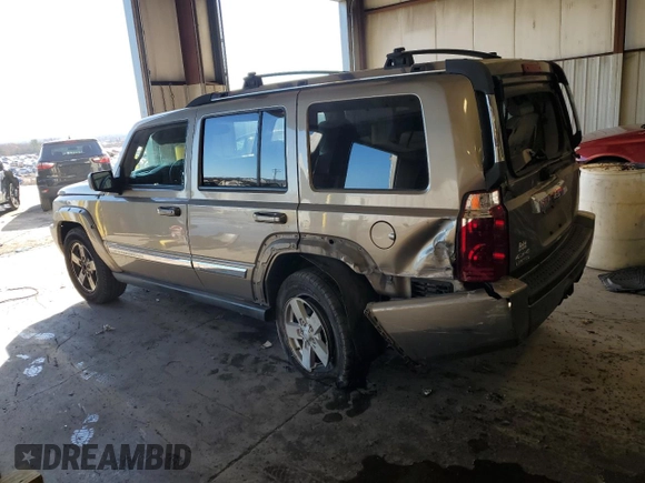 2006 Jeep Commander Limited z VIN 1J8HG58N86C305693, wystawiony jako Copart lot #80289634 z przebiegiem 158 711 mil mil oraz Szkoda całkowita • Salvage title. Historia ofert i sprzedaży dostępna na DreamBid. Obrazek 2.