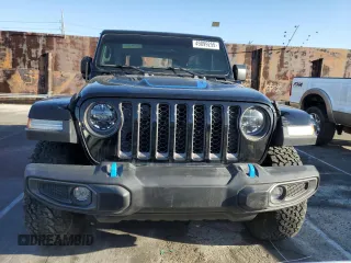 2022 Jeep Wrangler Unlimited Rubicon with VIN 1C4JJXR64NW198894, listed as a Copart auction lot 49899255 with 25,120 mi miles and Salvage title. Bid and sale history available at DreamBid. Image 5.