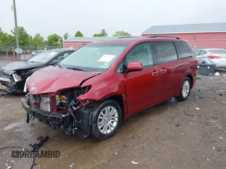 2015 Toyota Sienna XLE z VIN 5TDYK3DC9FS569714, wystawiony jako IAAI lot #42297410 z przebiegiem 114 802 mil mil oraz . Historia ofert i sprzedaży dostępna na DreamBid. Obrazek 2.