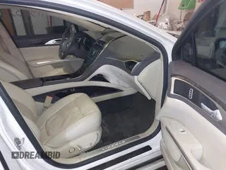 2014 Lincoln MKZ with VIN 3LN6L2J92ER836146, listed as a IAAI auction lot 41583343 with 130,613 mi miles. Bid and sale history available at carsss.com. Image 5.