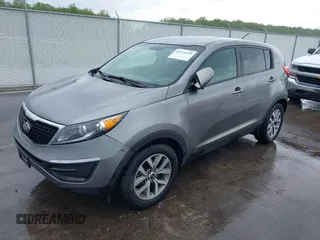 2015 Kia Sportage LX with VIN KNDPB3AC1F7784479, listed as a IAAI auction lot 42124599 with 137,190 mi miles and . Bid and sale history available at carsss.com. Image 2.