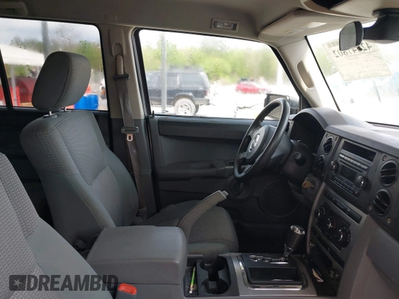 2007 Jeep Commander Sport with VIN 1J8HH48K47C535035, listed as a IAAI auction lot 42047802 with 165,538 mi miles and . Bid and sale history available at DreamBid. Image 5.