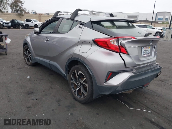 2018 Toyota C-HR XLE with VIN JTNKHMBX5J1011568, listed as a IAAI auction lot 42043867 with 30,699 mi miles. Bid and sale history available at carsss.com. Image 3.