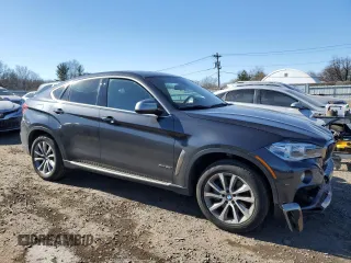 2016 BMW X6 xDrive50i with VIN 5UXKU6C59G0S82414, listed as a Copart auction lot 46219425 with 77,359 mi miles and Salvage Title. Bid and sale history available at carsss.com. Image 4.