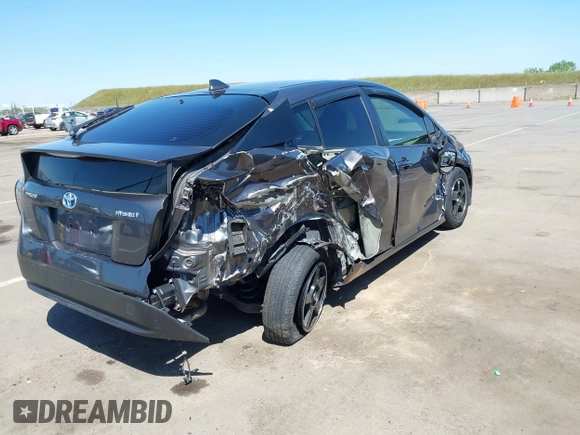 2016 Toyota Prius Two z VIN JTDKBRFU1G3521884, wystawiony jako IAAI lot #42081852 z przebiegiem 93 107 mil mil oraz . Historia ofert i sprzedaży dostępna na DreamBid. Obrazek 4.
