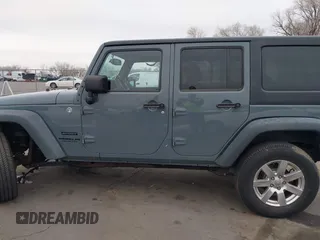 2014 Jeep Wrangler Unlimited Sport with VIN 1C4BJWDG4EL319259, listed as a IAAI auction lot 41494299 with 141,699 mi miles. Bid and sale history available at carsss.com. Image 14.