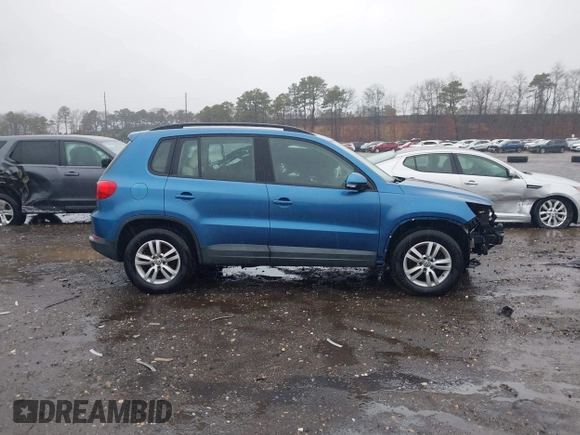 2017 Volkswagen Tiguan S with VIN WVGBV7AX8HK009247, listed as a IAAI auction lot 41346498 with 190,952 mi miles and . Bid and sale history available at DreamBid. Image 13.