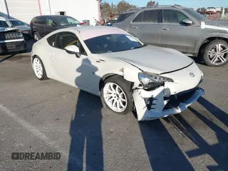 2019 Toyota 86 GT with VIN JF1ZNAE19K8701128, listed as a IAAI auction lot 41133417 with 71,529 mi miles. Bid and sale history available at carsss.com. Image 1.