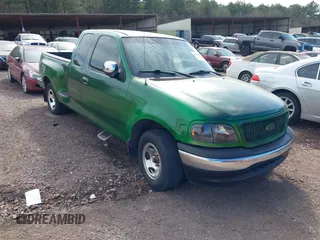 2001 Ford F-150 XL with VIN 2FTRX07WX1CA79197, listed as a IAAI auction lot 41655618 with 267,846 mi miles. Bid and sale history available at carsss.com. Image 1.