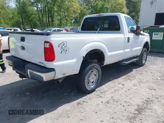 2014 Ford F-250 XL with VIN 1FTBF2B61EEA36052, listed as a IAAI auction lot 41936441 with 65,916 mi miles and . Bid and sale history available at DreamBid. Image 4.