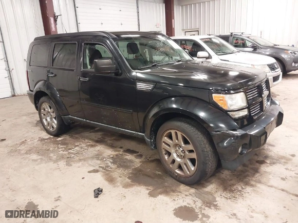 2011 Dodge Nitro Heat with VIN 1D4PU4GX0BW517654, listed as a IAAI auction lot 41715627 with 107,954 mi miles. Bid and sale history available at carsss.com. Image 1.