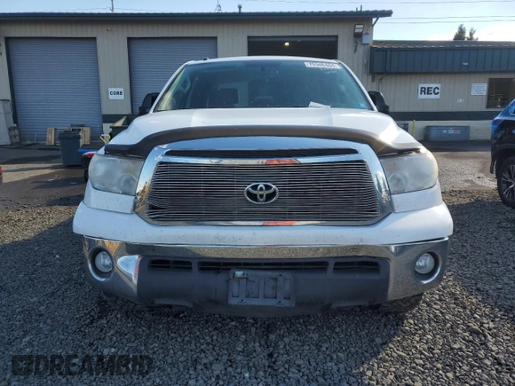 2011 Toyota Tundra 4WD Truck with VIN 5TFDM5F18BX021093, listed as a Copart auction lot 70346484 with 205,452 mi miles and Salvage Title. Bid and sale history available at carsss.com. Image 5.