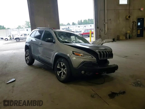 2014 Jeep Cherokee Trailhawk with VIN 1C4PJMBSXEW213981, listed as a Copart auction lot 60440495 with 136,612 mi miles and Salvage title. Bid and sale history available at DreamBid. Image 15.