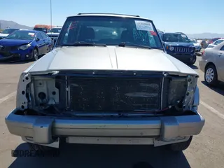 2000 Jeep Cherokee Classic with VIN 1J4FF58S5YL260331, listed as a IAAI auction lot 41584008 with 224,100 mi miles. Bid and sale history available at carsss.com. Image 6.