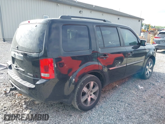 2013 Honda Pilot Touring with VIN 5FNYF3H93DB031630, listed as a IAAI auction lot 42237899 with 198,523 mi miles and . Bid and sale history available at DreamBid. Image 4.