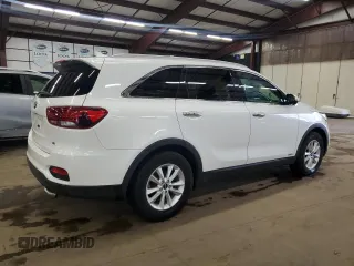 2019 Kia Sorento LX z VIN 5XYPGDA59KG456393, wystawiony jako Copart lot #61352805 z przebiegiem 102 479 mil mil oraz Czysty tytuł • Clean title. Historia ofert i sprzedaży dostępna na DreamBid. Obrazek 3.