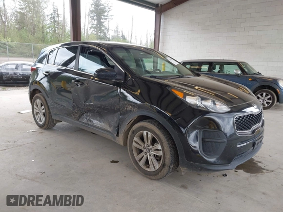 2018 Kia Sportage LX with VIN KNDPM3AC7J7463078, listed as a IAAI auction lot 42086356 with 75,406 mi miles and . Bid and sale history available at carsss.com. Image 1.