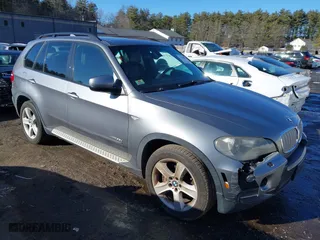 2010 BMW X5 35d with VIN 5UXFF0C54ALT77185, listed as a IAAI auction lot 41699375 with 151,770 mi miles. Bid and sale history available at carsss.com. Image 1.