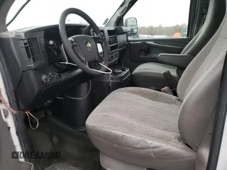 2012 Chevrolet Express Passenger 1LT with VIN 1GAZGYFG3C1118315, listed as a Copart auction lot 80870104 with 122,178 mi miles and Salvage title. Bid and sale history available at DreamBid. Image 7.