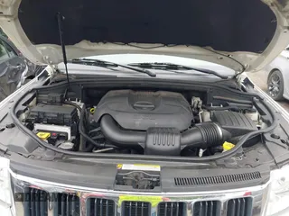 2011 Jeep Grand Cherokee Laredo with VIN 1J4RR4GG0BC670506, listed as a IAAI auction lot 42462778 with 241,406 mi miles and . Bid and sale history available at DreamBid. Image 10.