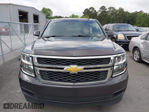 2015 Chevrolet Tahoe LS with VIN 1GNSCAKC0FR245826, listed as a IAAI auction lot 42282590 with 164,208 mi miles and . Bid and sale history available at DreamBid. Image 12.