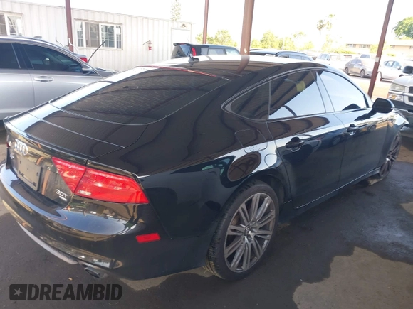 2015 Audi A7 Prestige with VIN WAU2GAFC2FN029875, listed as a IAAI auction lot 42032648 with 116,588 mi miles and . Bid and sale history available at DreamBid. Image 4.