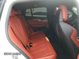 2022 BMW X4 M z VIN 5YM23EC01N9J82231, wystawiony jako Copart lot #43271695 z przebiegiem 20 715 mil mil oraz Szkody całkowita. Historia ofert i sprzedaży dostępna na DreamBid. Obrazek 11.