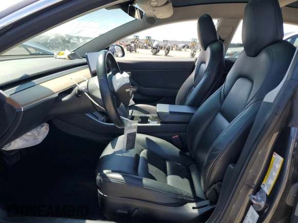 2019 Tesla Model 3 Mid Range with VIN 5YJ3E1EA2KF416304, listed as a Copart auction lot 52792845 with 140,552 mi miles and Salvage Title. Bid and sale history available at DreamBid. Image 7.