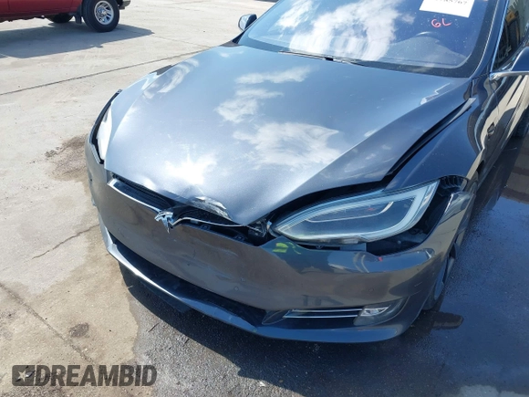 2017 Tesla Model S 100D with VIN 5YJSA1E29HF204881, listed as a IAAI auction lot 41785767 with 146,523 mi miles and . Bid and sale history available at DreamBid. Image 6.