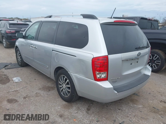 2012 Kia Sedona EX with VIN KNDMH4C74C6497243, listed as a IAAI auction lot 41368080 with 218,806 mi miles. Bid and sale history available at carsss.com. Image 3.