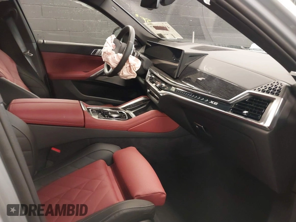 2025 BMW X6 xDrive40i with VIN 5UX33EX04S9Z44291, listed as a IAAI auction lot 41827897 with 1,053 mi miles. Bid and sale history available at carsss.com. Image 5.