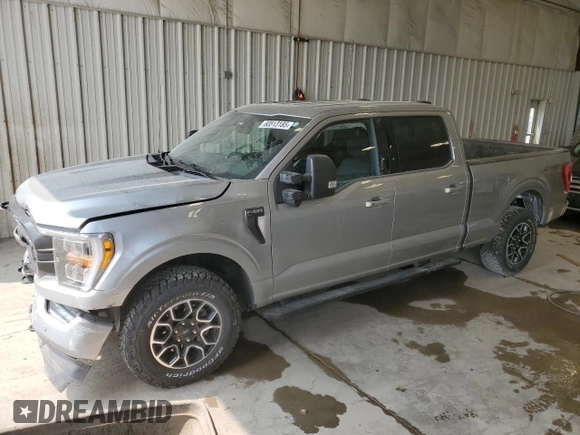 2021 Ford F-150 XL with VIN 1FTFW1E85MKE03933, listed as a Copart auction lot 60513185 with 82,793 mi miles and Salvage title. Bid and sale history available at DreamBid. Image 1.
