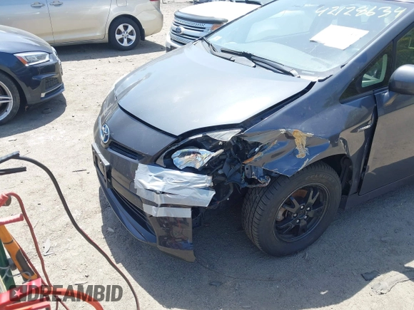 2012 Toyota Prius One z VIN JTDKN3DU6C1504544, wystawiony jako IAAI lot #42128634 z przebiegiem 298 344 mil mil oraz . Historia ofert i sprzedaży dostępna na DreamBid. Obrazek 6.