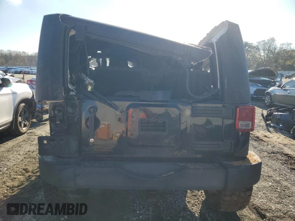 2015 Jeep Wrangler Willys Wheeler with VIN 1C4AJWAG8FL648645, listed as a Copart auction lot 74334884 with Not provided miles and Salvage title. Bid and sale history available at DreamBid. Image 6.