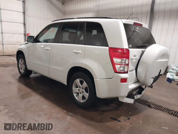 2006 Suzuki Grand Vitara Premium with VIN JS3TD943664100584, listed as a IAAI auction lot 41453129 with 159,220 mi miles and . Bid and sale history available at DreamBid. Image 3.