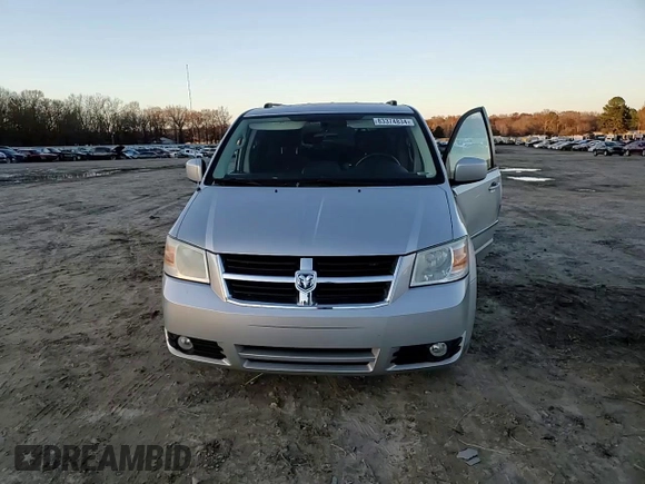 2010 Dodge Grand Caravan SXT with VIN 2D4RN5D16AR496795, listed as a Copart auction lot 83374834 with 99,902 mi miles and Salvage Title. Bid and sale history available at DreamBid. Image 11.