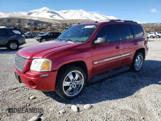 2004 GMC Envoy SLT with VIN 1GKDT13S242417226, listed as a Copart auction lot 46111865 with 375,450 mi miles and Salvage Title. Bid and sale history available at DreamBid. Image 1.